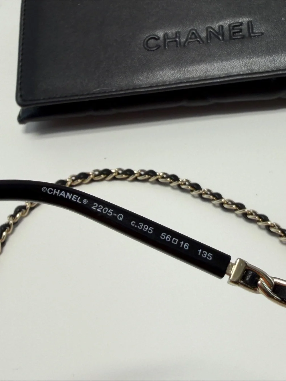CHANEL  Gold and Black Eye ear Chain with Silver-Tone Glasses